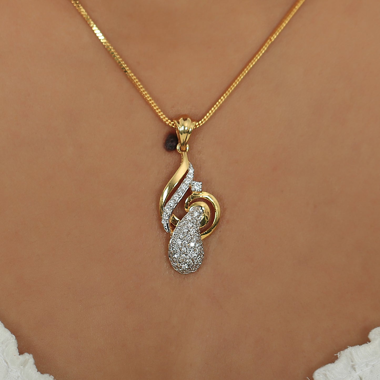 Glimmering Teardrop Swirl Diamond Pendant Set