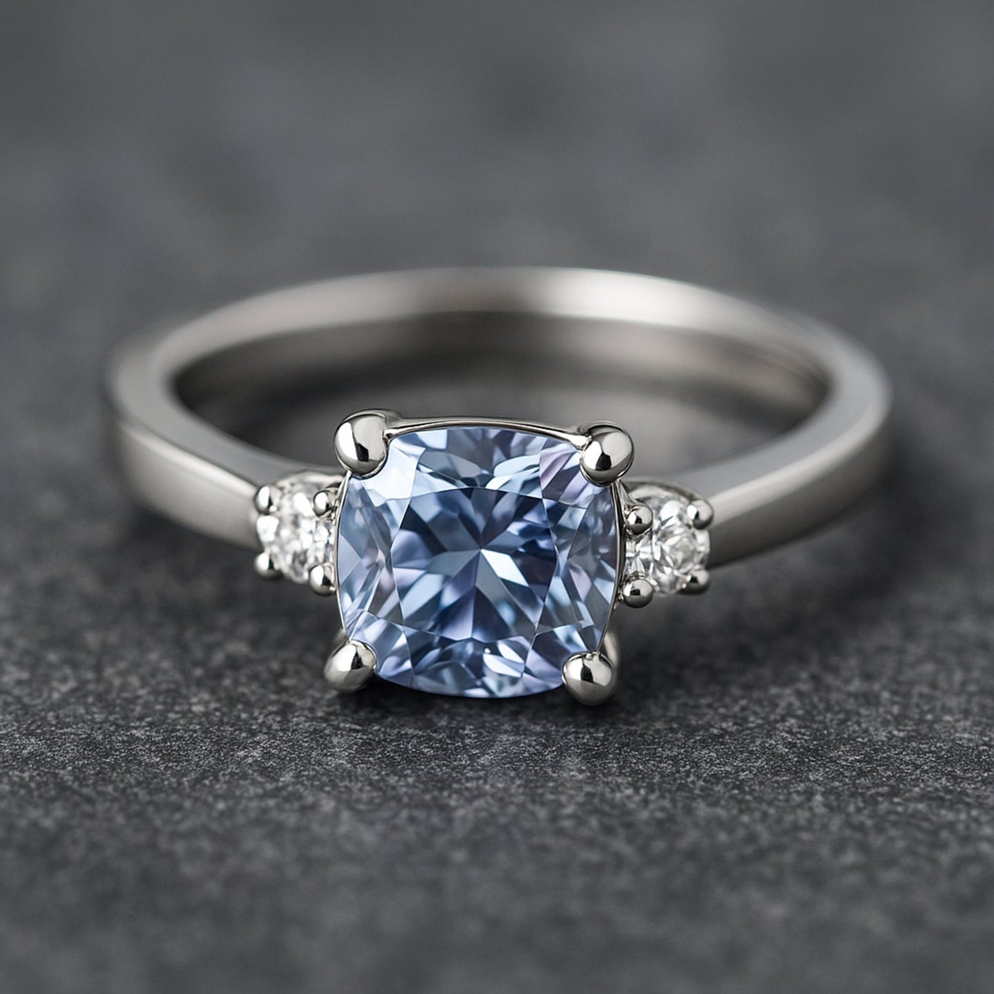 Top view of blue emerald cut lab diamond showing step facets and ocean blue hue