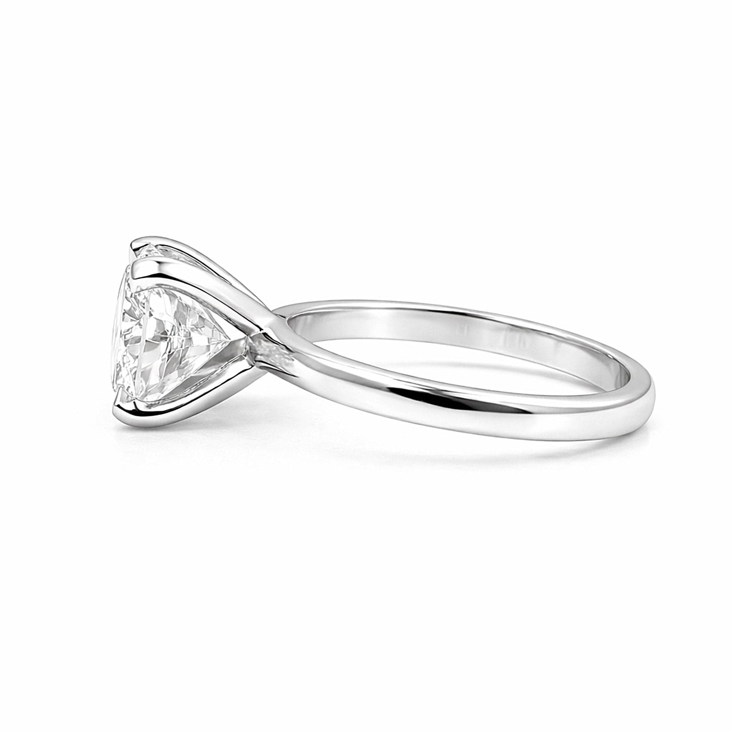 Cushion cut lab diamond ring worn on hand, vintage-inspired engagement style