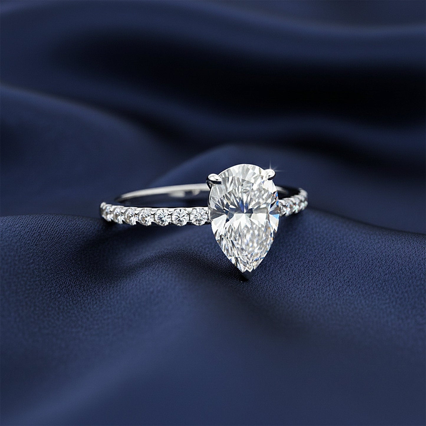 Close-up of pear cut lab-grown diamond, VS1 clarity, full crown view