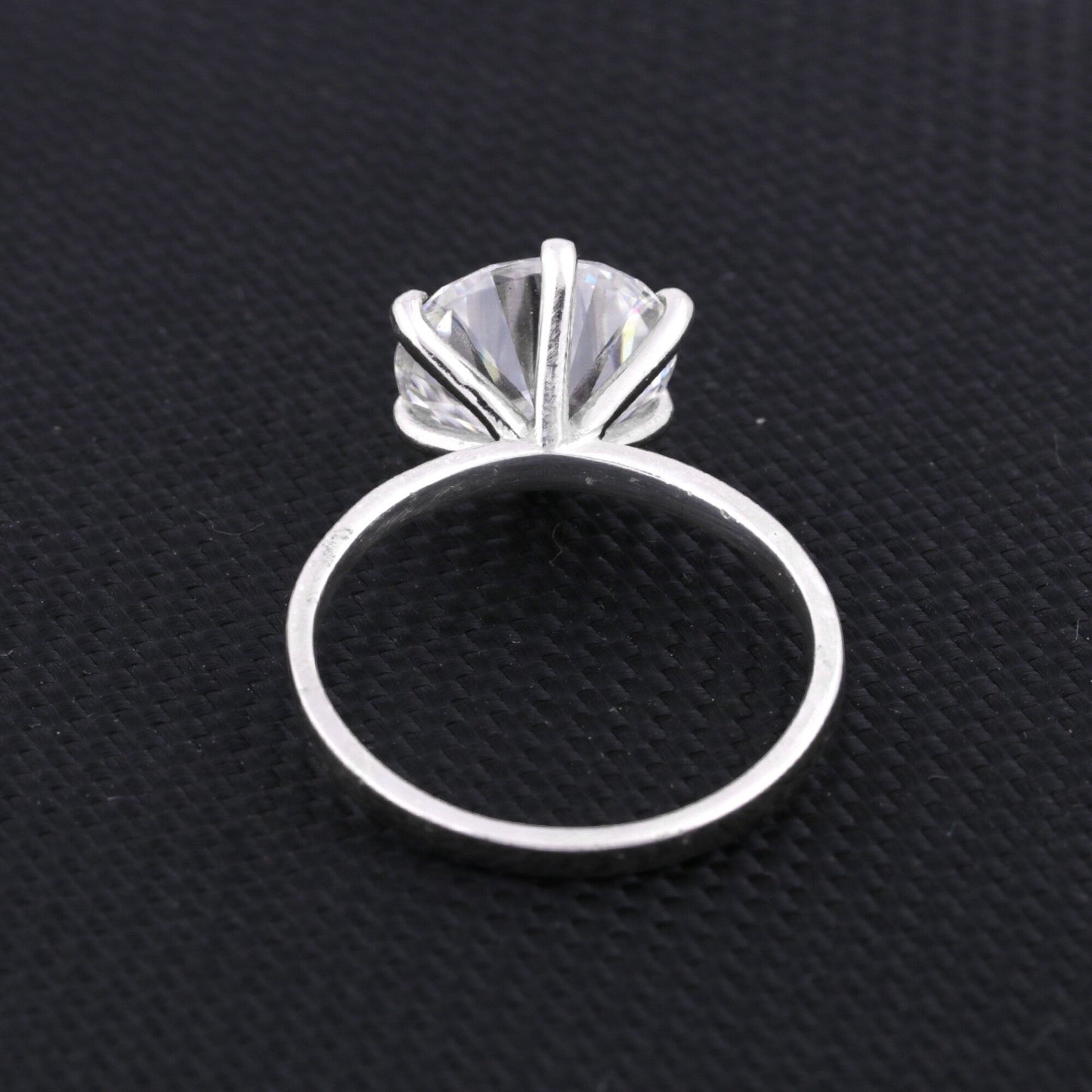 925 sterling silver inner band with 18k gold vermeil finish on solitaire