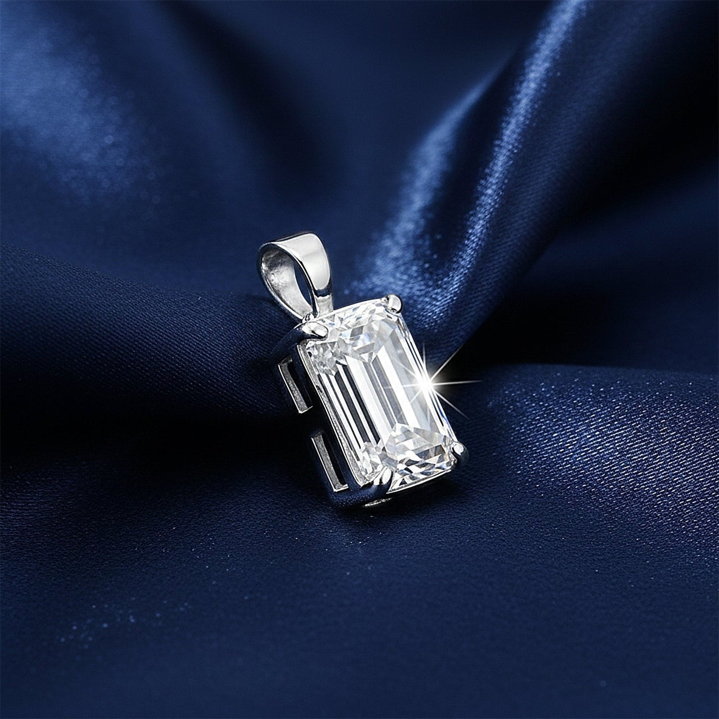 GEMHUB 3.30 Ct emerald cut lab grown diamond pendant, VS1 clarity, 18k gold vermeil setting on navy blue satin.