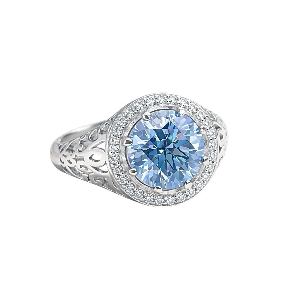 GEMHUB 3.50 Ct round cut blue lab-grown diamond ring with VS1 clarity, set in 18k gold vermeil with a halo of smaller diamonds.