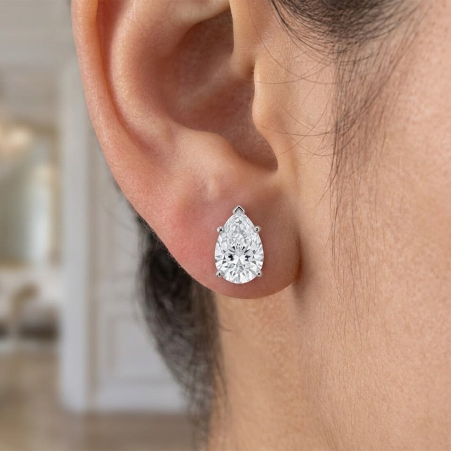 GEMHUB Pear-shaped lab-created diamond stud earrings in 950 platinum, 1 ct total weight, F/VS clarity.