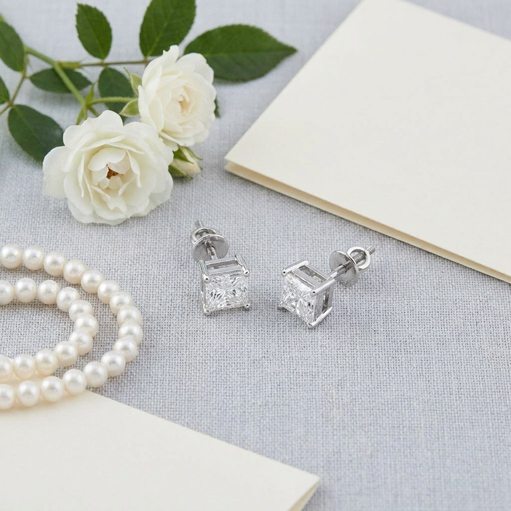 Princess cut diamond studs with pearls and a handwritten card