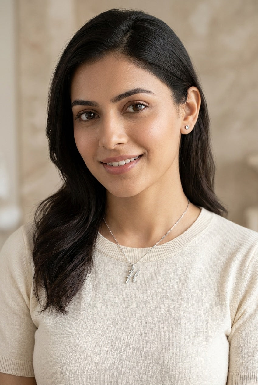 GEMHUB model wearing initial H pendant