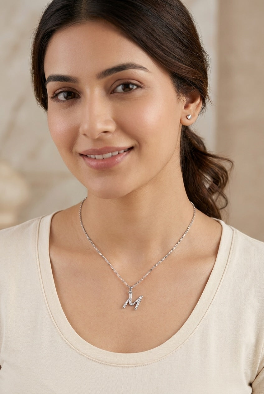 GEMHUB model wearing initial M pendant