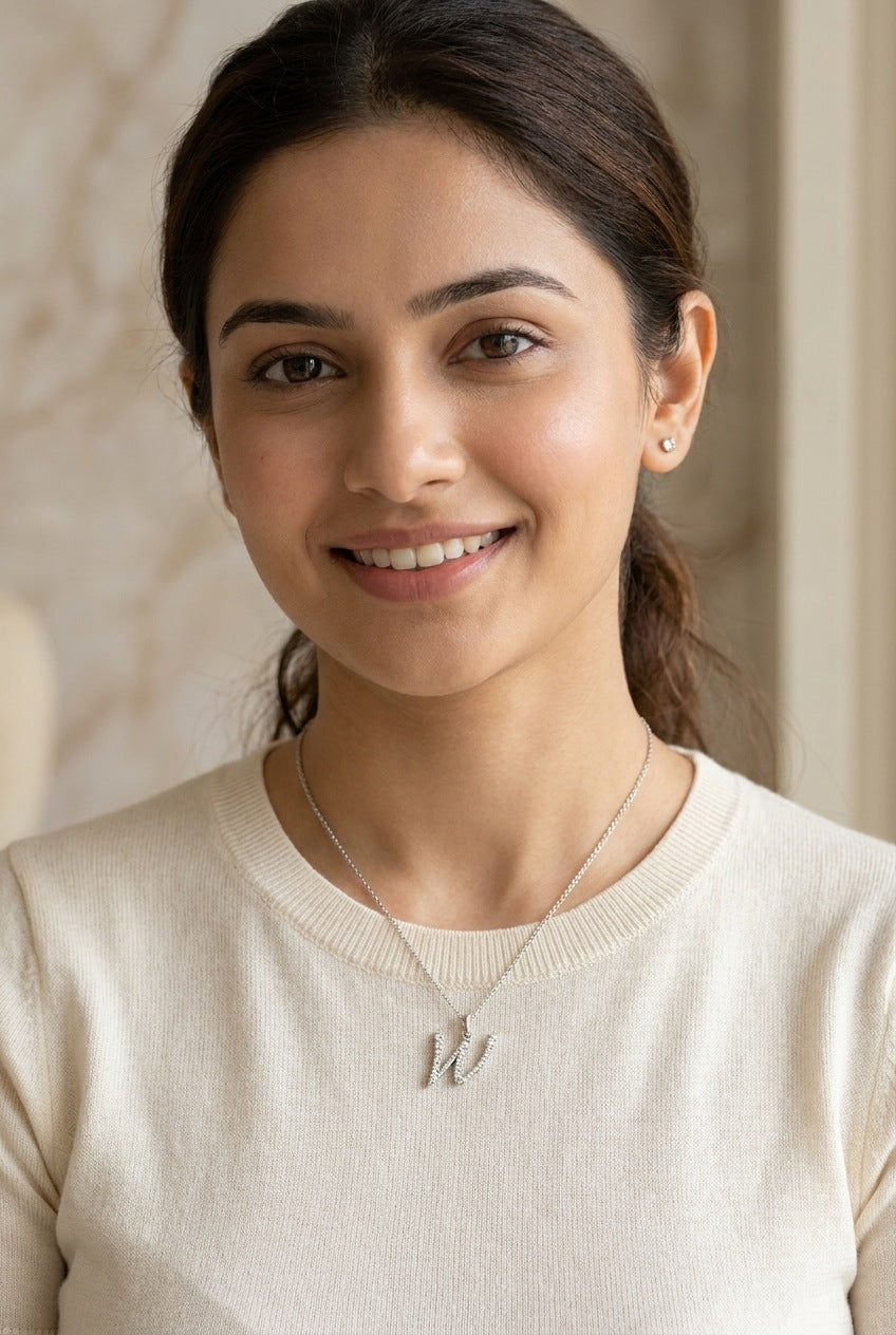 GEMHUB model wearing initial W pendant