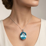 GEMHUB model-wearing (AI) Blue Topaz Oval 135 Ct