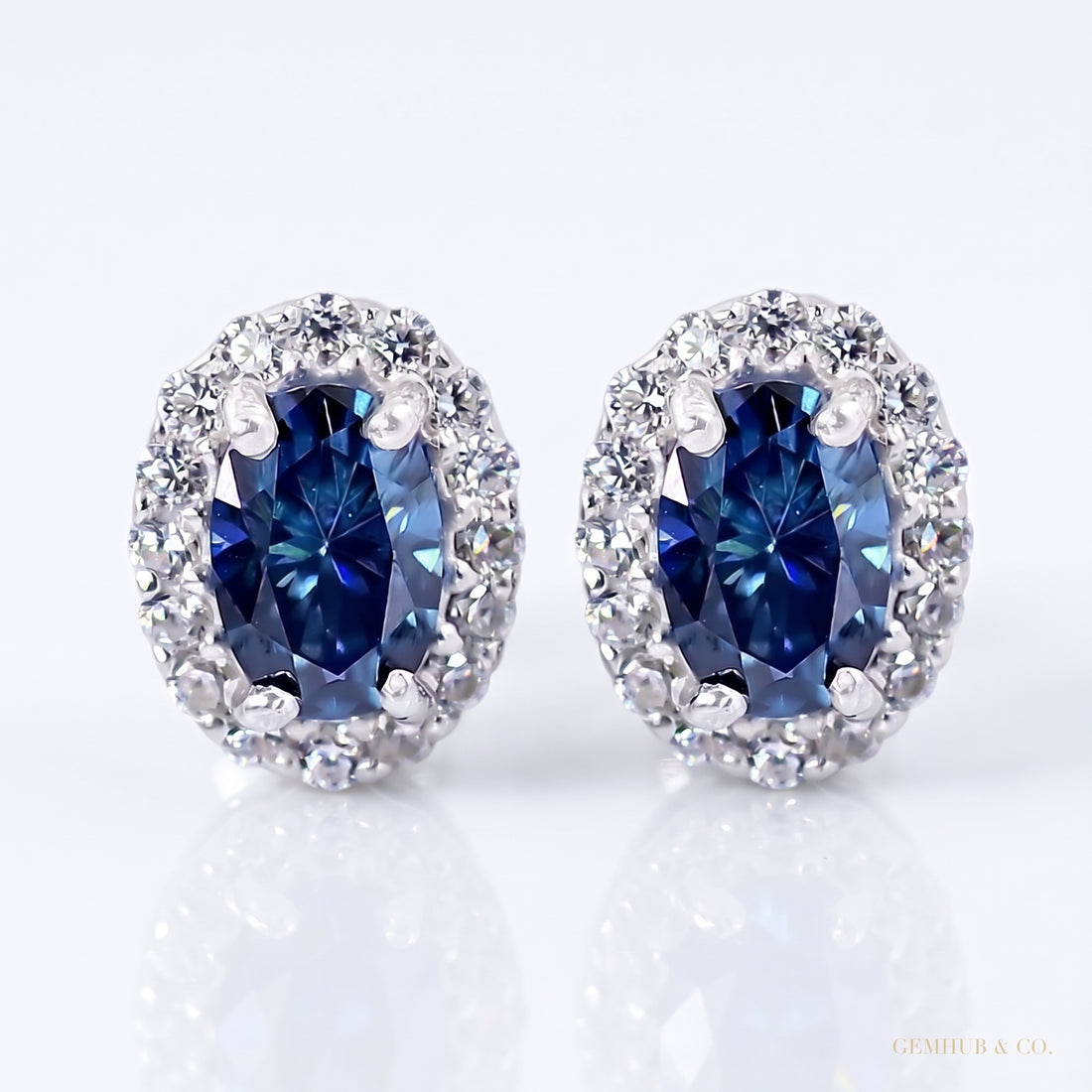 2.00ct DEW certified blue moissanite halo stud earrings in gold vermeil - white background main image