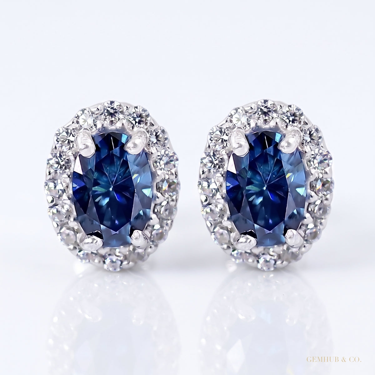2.00ct DEW certified blue moissanite halo stud earrings in gold vermeil - white background main image