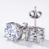 4.20ct DEW white moissanite round solitaire stud earrings in gold vermeil - studio product photo