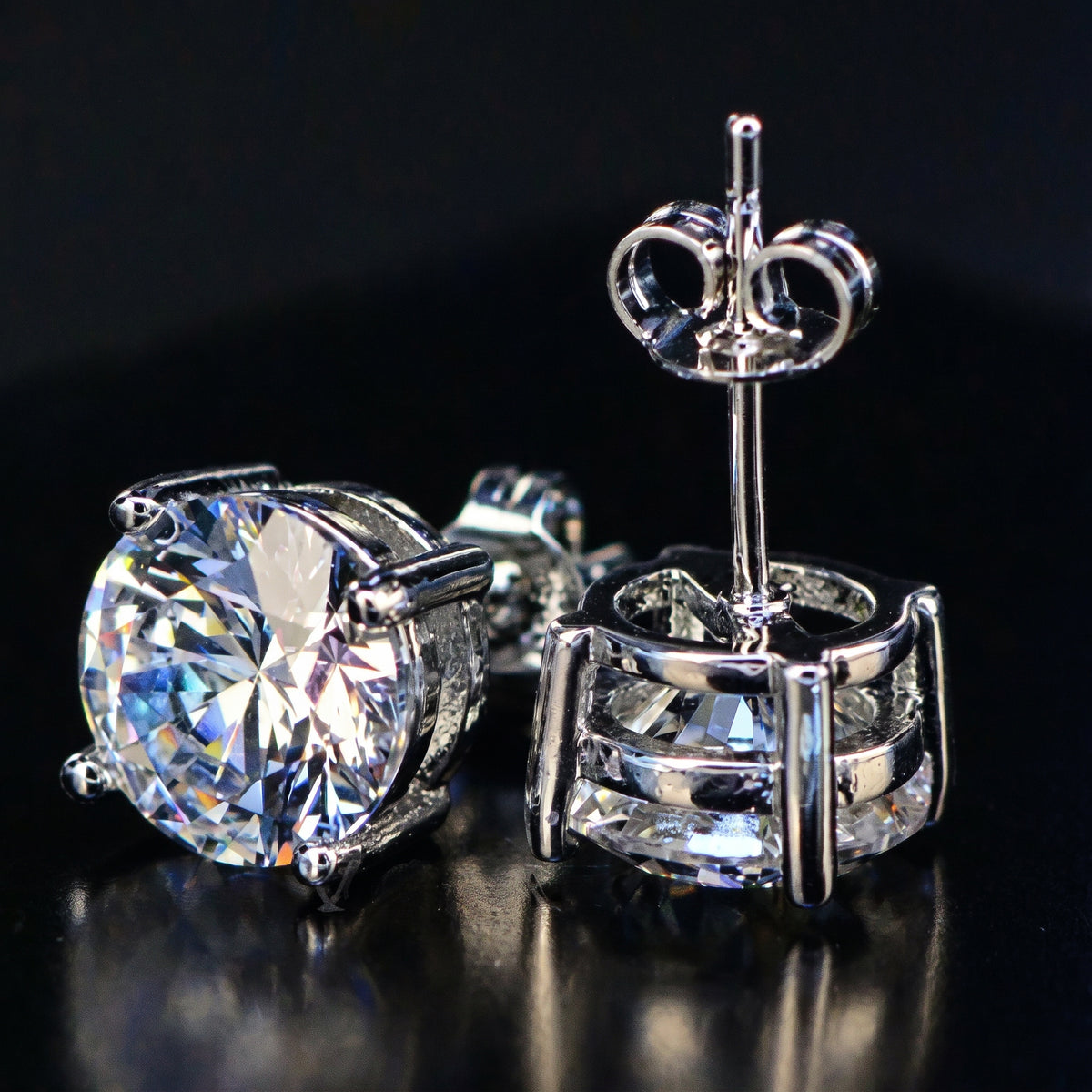 4.20ct white moissanite round studs - detail of butterfly back and post
