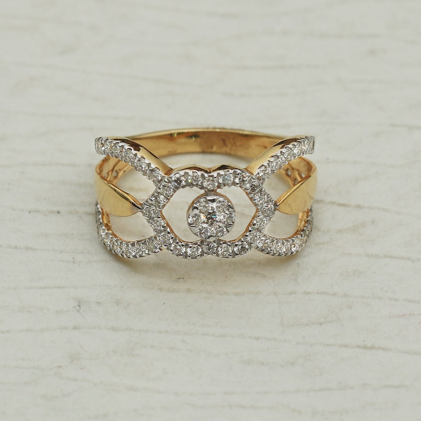 Gold and Diamond Ring with an Interlaced Openwork Design