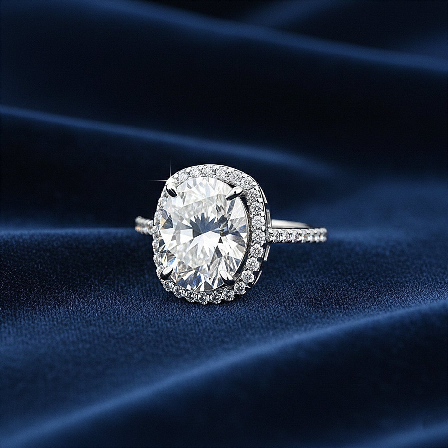 Top view of round brilliant lab diamond ring showing prong setting and fire