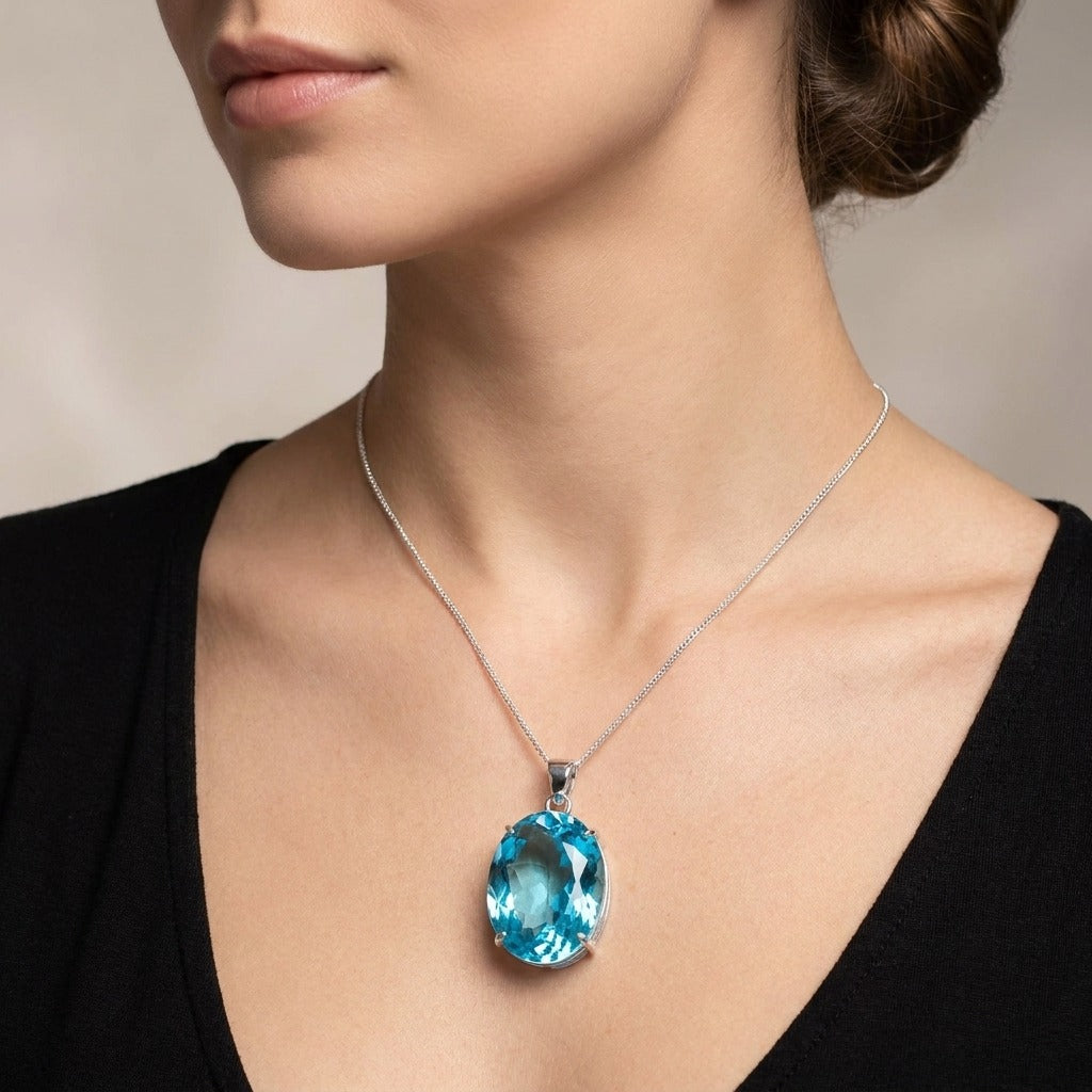 GEMHUB model-wearing (AI) Swiss Blue Topaz Oval 44 Ct
