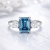 Top view of blue cushion lab diamond showing soft square shape and ocean hue