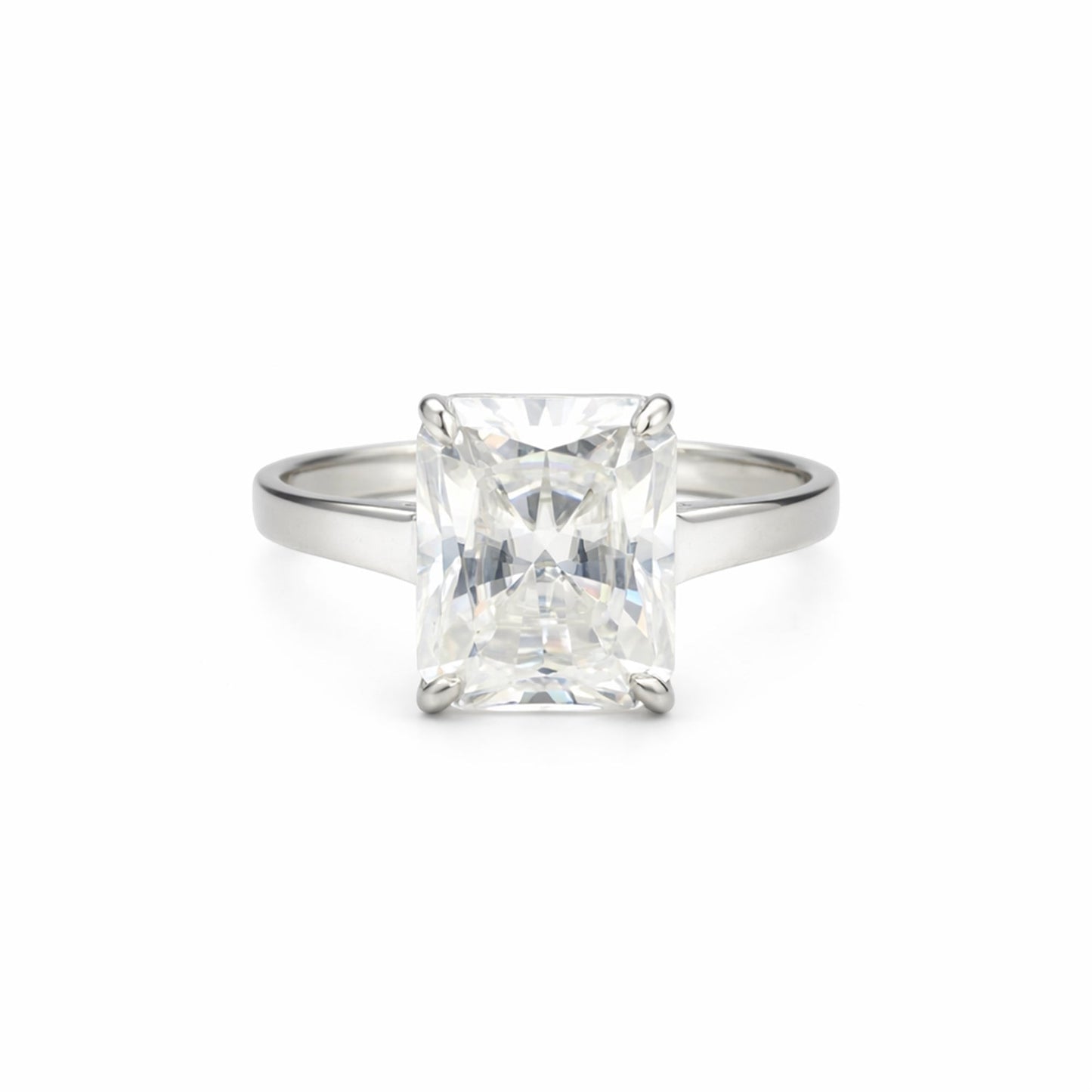 Emerald cut lab diamond ring worn on hand, art deco engagement styling