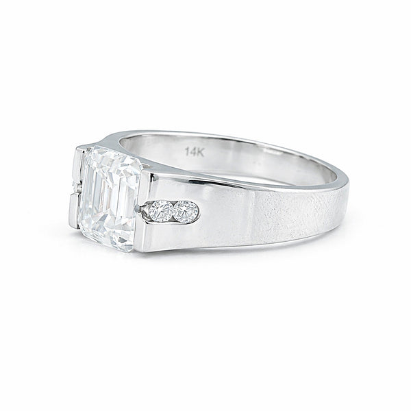 Emerald cut lab diamond ring worn on hand, art deco engagement styling