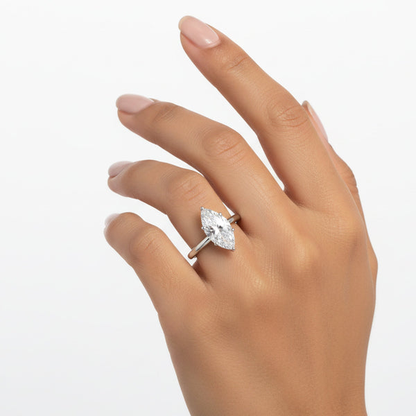 1.50 ct DEW Certified Marquise Cut White Moissanite Ring In 18K Gold Plated