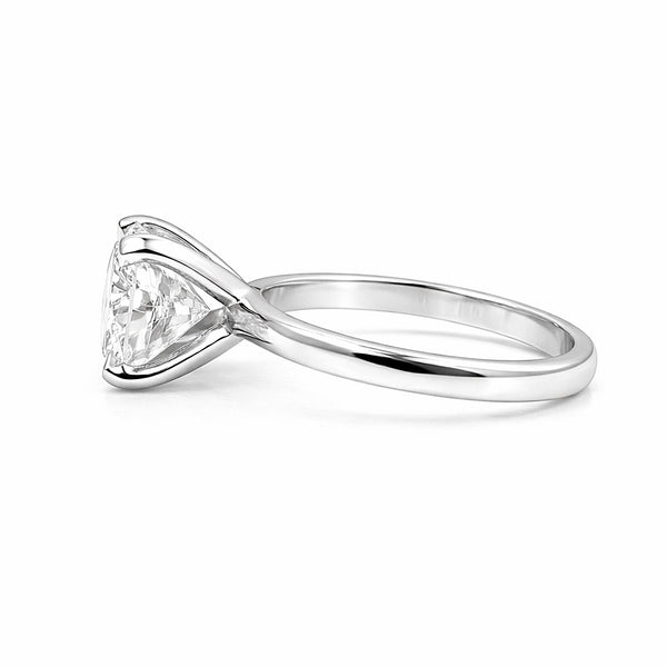 Cushion cut lab diamond ring worn on hand, vintage-inspired engagement style