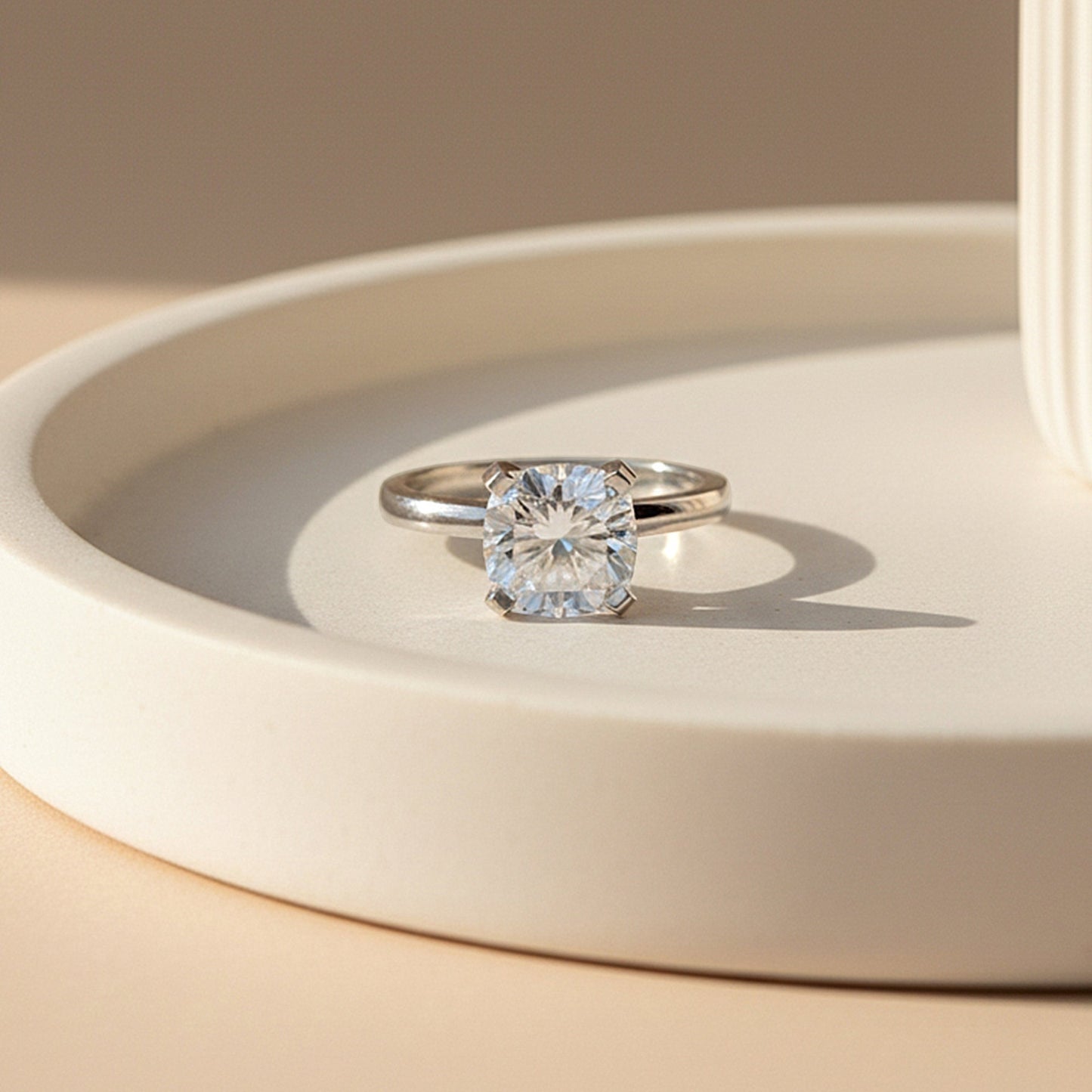 Inner band of 925 sterling silver with 18k gold vermeil on cushion solitaire