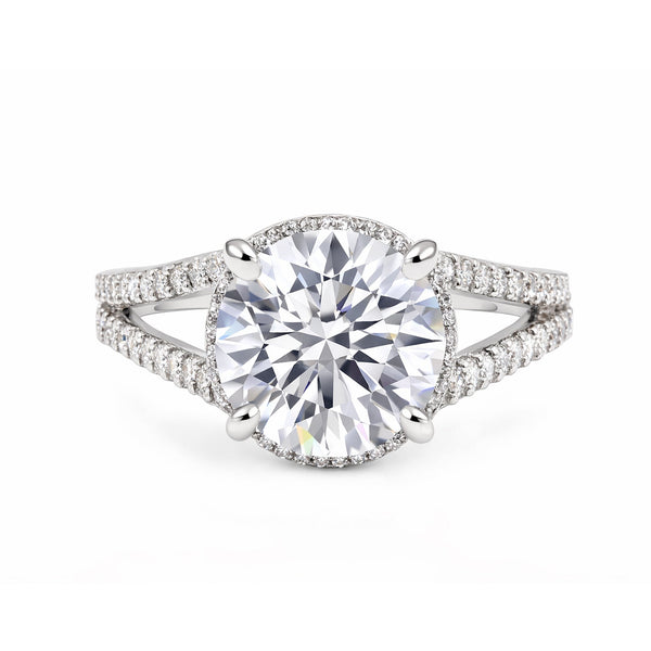 Close-up of round brilliant centre stone with pavé-set diamond accent stones