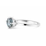 Fancy blue lab diamond ring worn on hand, statement engagement styling