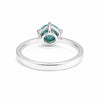 Close-up of round brilliant blue lab diamond, VS1 clarity, fancy colour grade