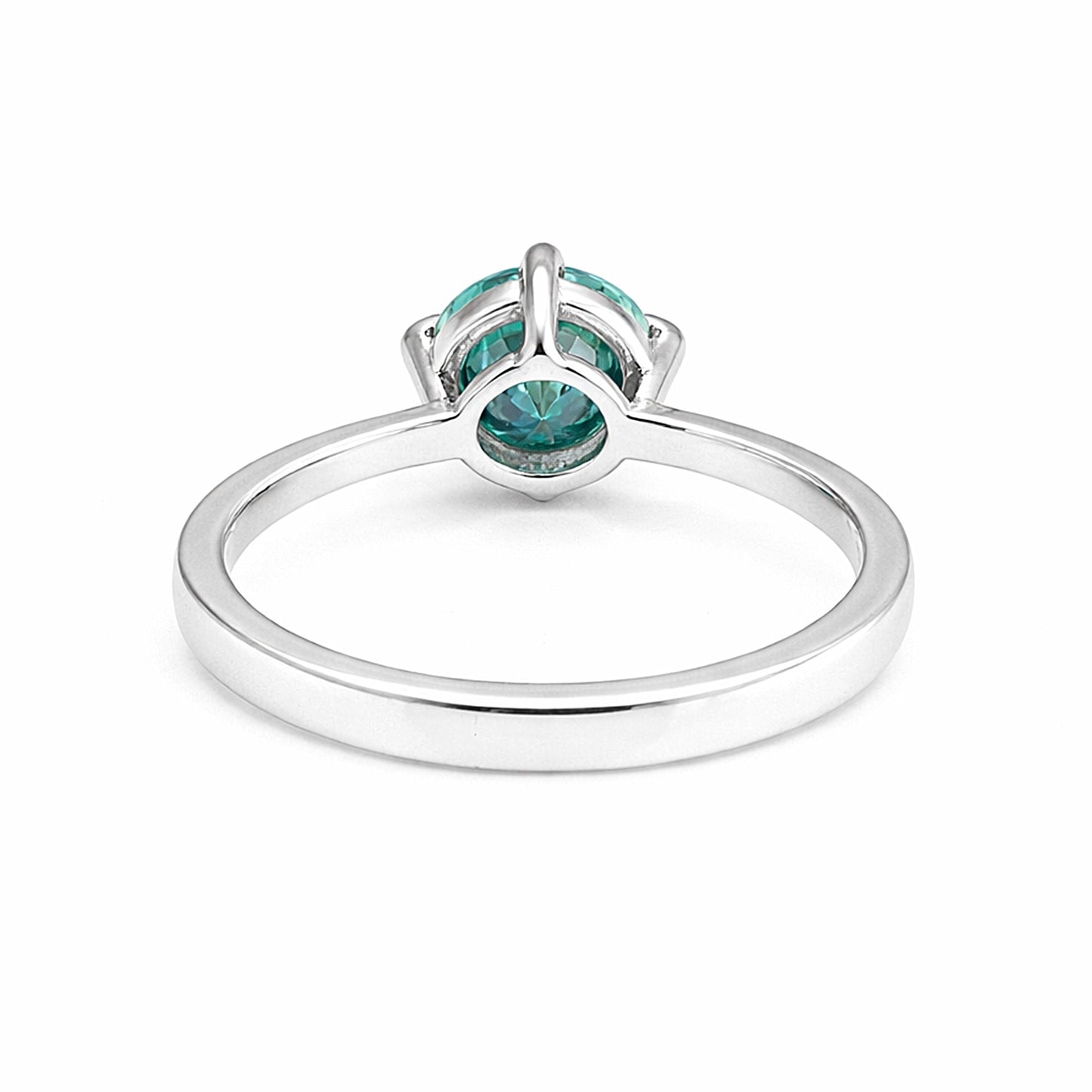 Close-up of round brilliant blue lab diamond, VS1 clarity, fancy colour grade