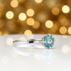 Detail of 18k gold vermeil setting with blue diamond, top-down vermeil finish