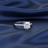 Detail of 18k gold vermeil prongs holding cushion-cut lab diamond