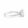 Cushion cut lab diamond ring worn on hand, classic vintage engagement style