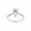 Pear-cut lab diamond ring worn on hand, elongating finger styling
