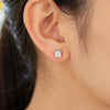Side profile of 4ct princess diamond earring with platinum four-prong setting