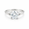 Side profile of round diamond solitaire with cathedral gold vermeil shoulders