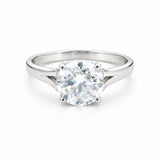 Side profile of round diamond solitaire with cathedral gold vermeil shoulders