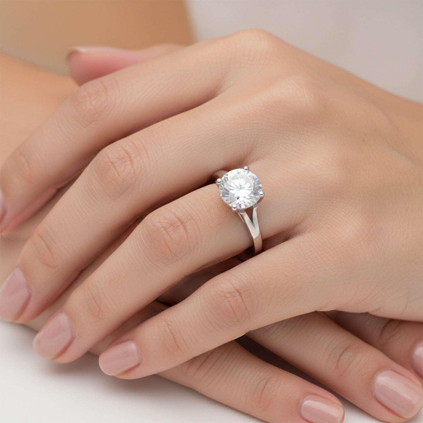 Top view of 3.4ct round brilliant lab diamond ring with vermeil prongs