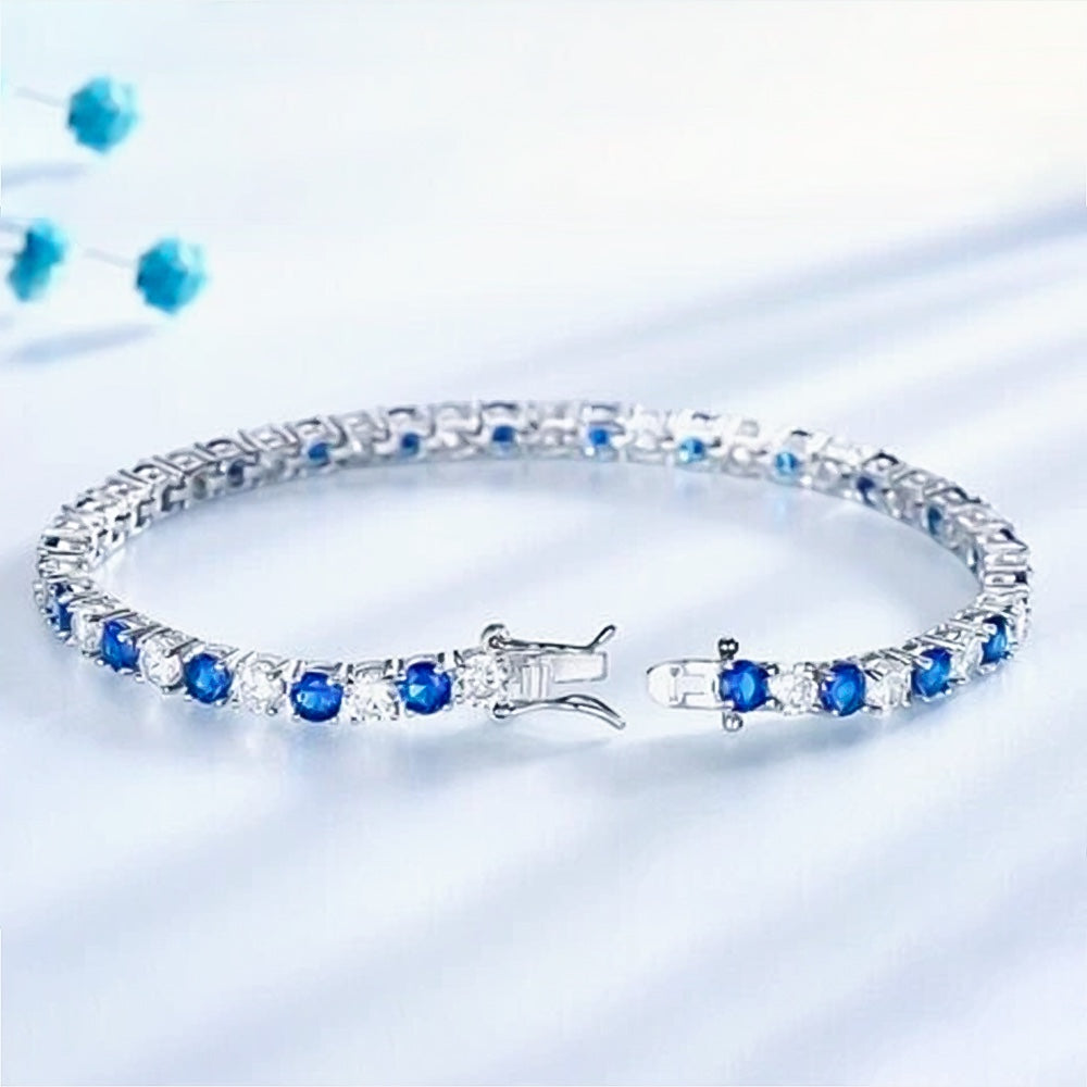 14k white gold tennis bracelet with blue sapphires and round diamonds, full length