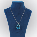 GEMHUB Blue Topaz Oval 88.5 Ct lab-grown gemstone pendant on display bust (AI render)