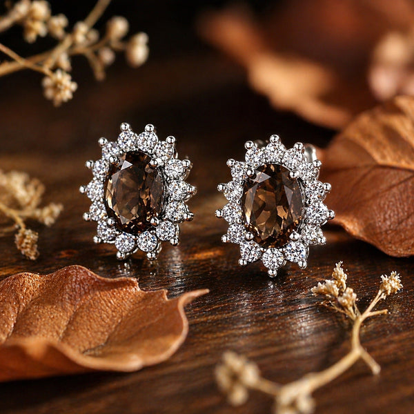 Side angle of smoky topaz earring with bezel-set sterling silver mounting
