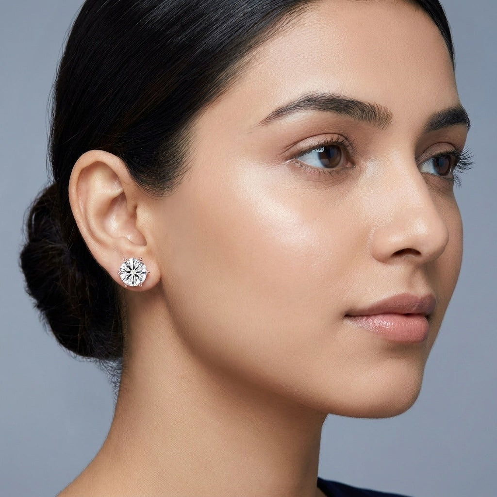 Round lab-grown diamond solitaire stud worn on the ear