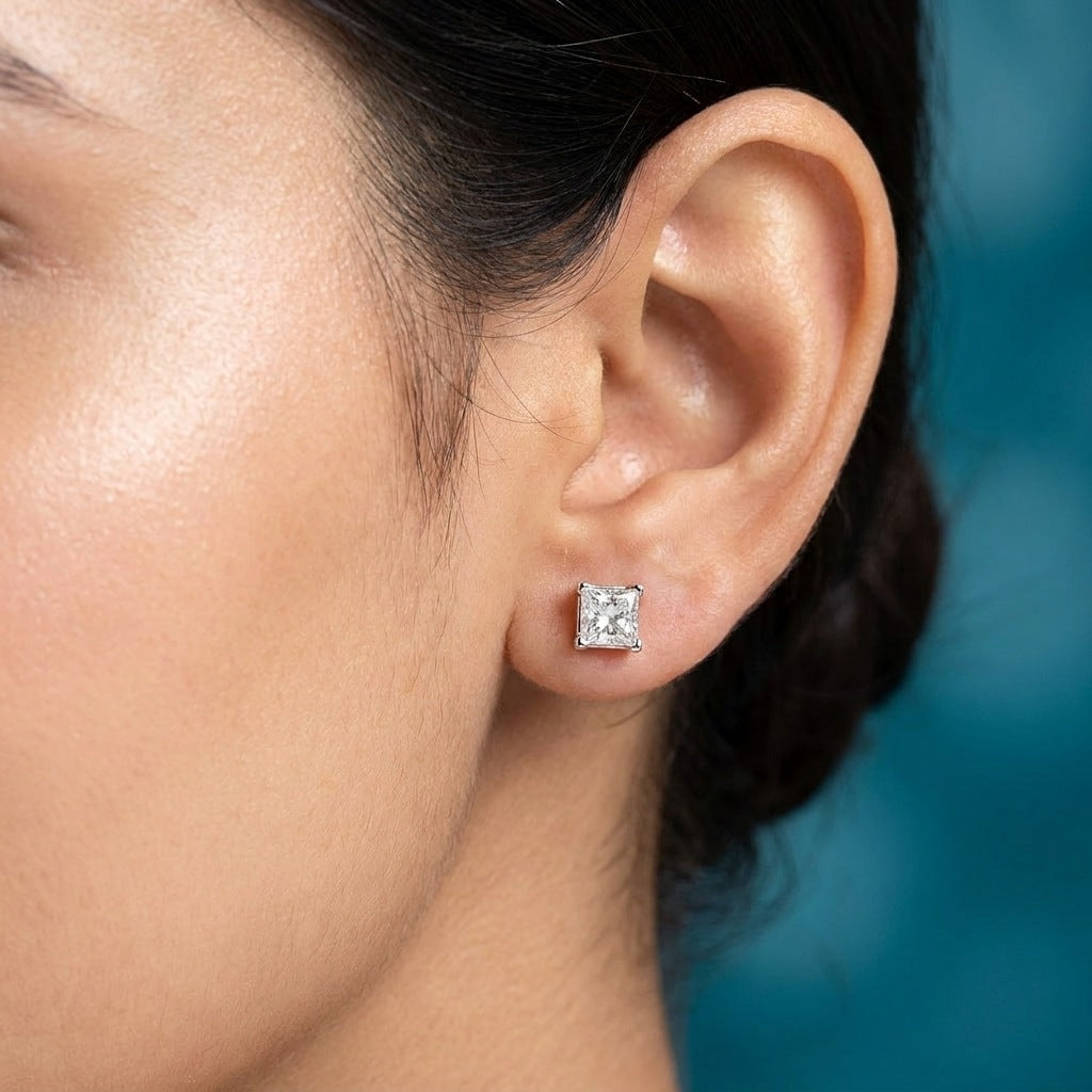 Close-up of the four-claw diamond stud on the earlobe