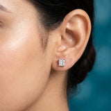 Close-up of the four-claw diamond stud on the earlobe
