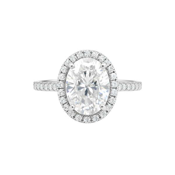 GEMHUB 3.00 Ct oval cut lab grown diamond ring with VS1 clarity, set in 18k gold vermeil with a halo of smaller diamonds.