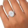 GEMHUB 3.00 Ct oval cut lab grown diamond ring with VS1 clarity, set in 18k gold vermeil with a halo of smaller diamonds.