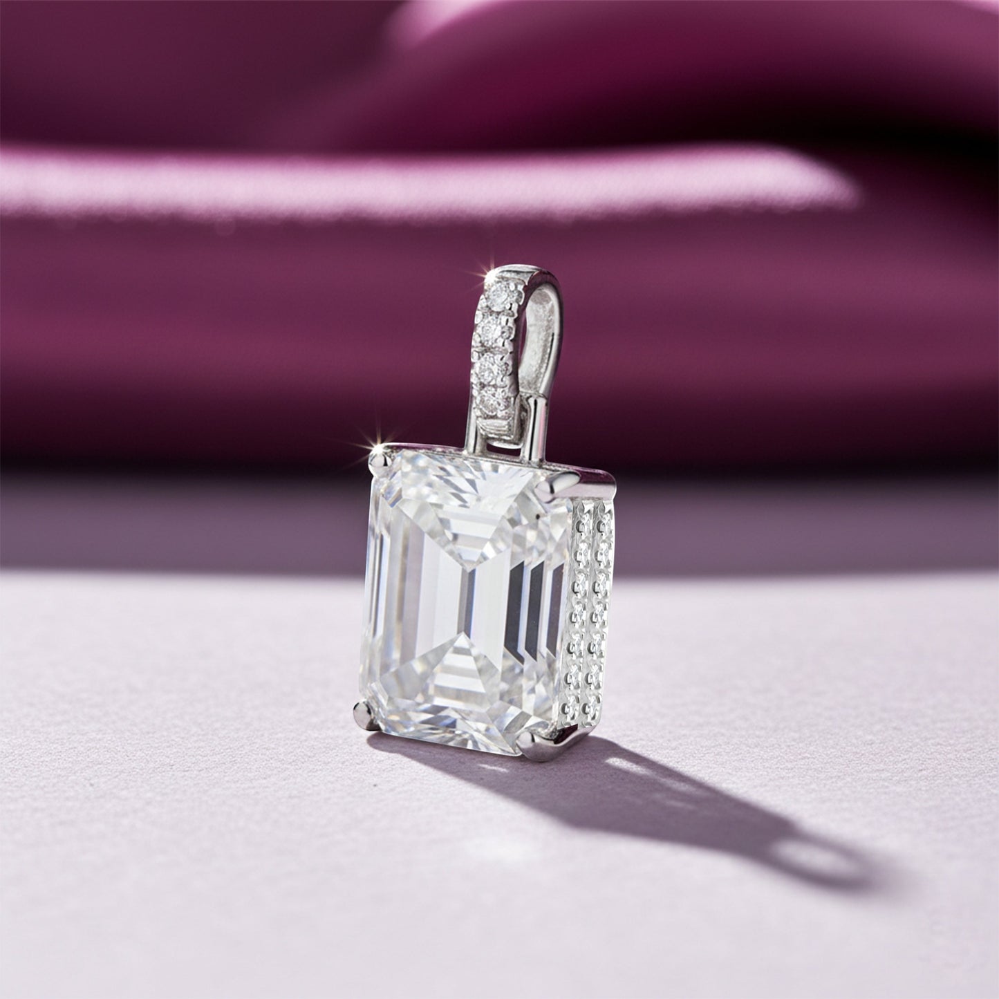 GEMHUB 4.50 Ct emerald cut lab-grown diamond pendant with VS1 clarity in 18k gold vermeil, accented with small diamonds on the bail.