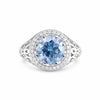 GEMHUB 3.50 Ct round cut blue lab-grown diamond ring with halo of small white stones, 18k gold vermeil band.