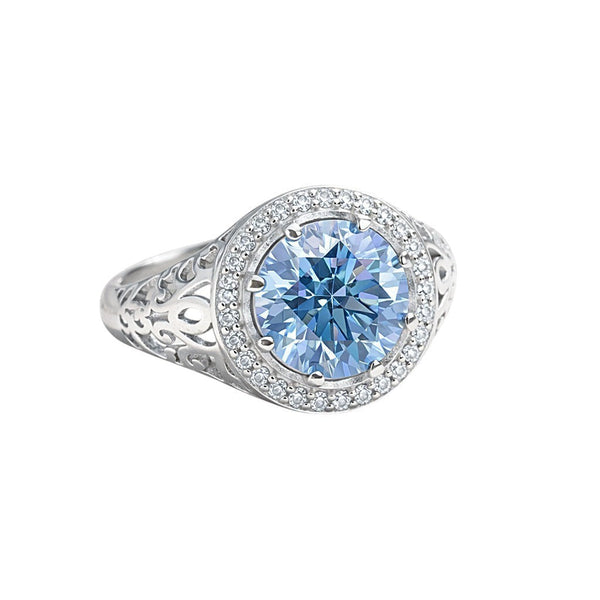 GEMHUB 3.50 Ct round cut blue lab-grown diamond ring with VS1 clarity, set in 18k gold vermeil with a halo of smaller diamonds.