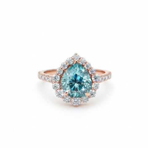 GEMHUB 4.70 Ct pear cut blue moissanite solitaire ring with halo, set in gold vermeil over sterling silver.
